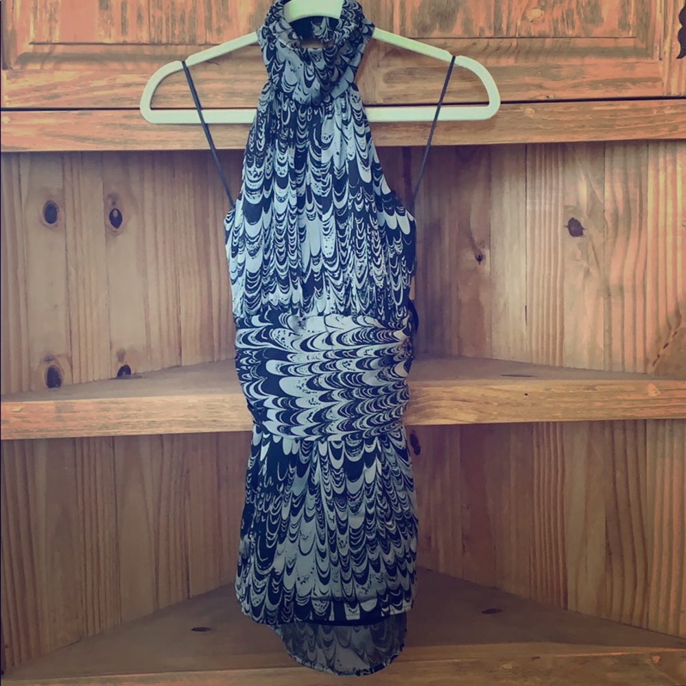 Sleeveless Black and Gray boutique shirt.